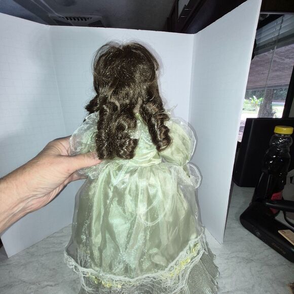 Heirloom Treasure Doll, Dark Long Curley Hair with Green Dress and Bow on Front - Picture 5 of 10